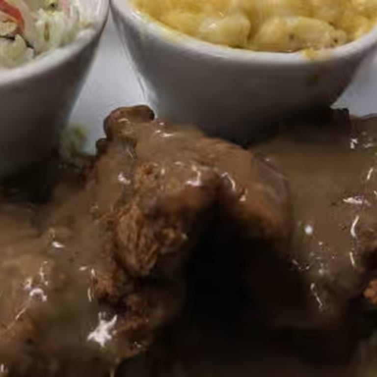 Savor Our Smothered Chicken